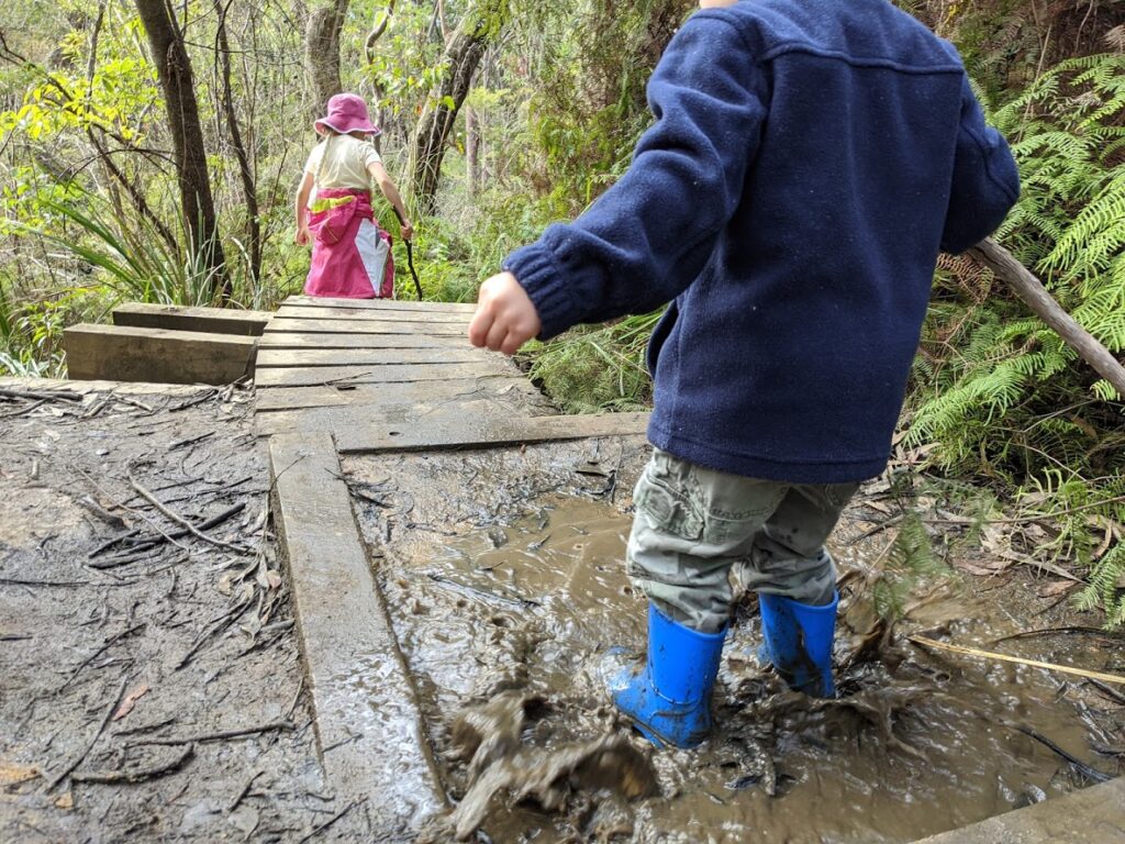 Horseshoe Falls Hazelbrook, kids splashing, muddy gumboots