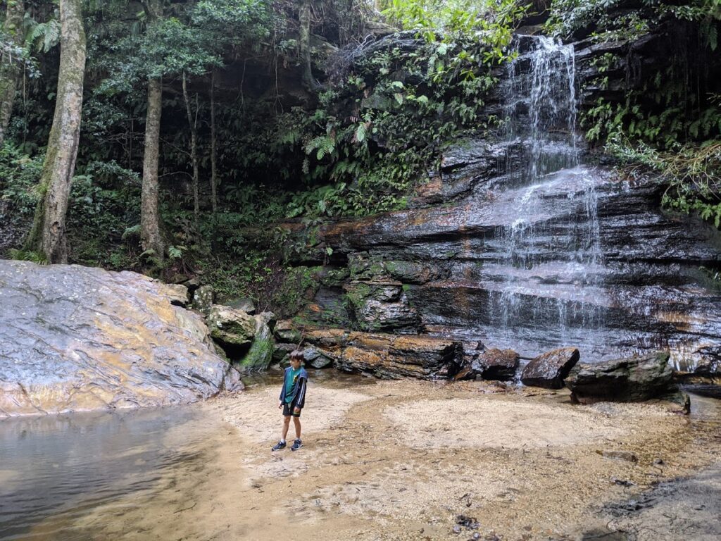 bushwalk safety, boy exploring the Blue Mountains National Park waterfalls