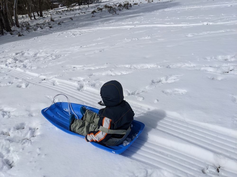tobogganing in the snow in the blue mountains