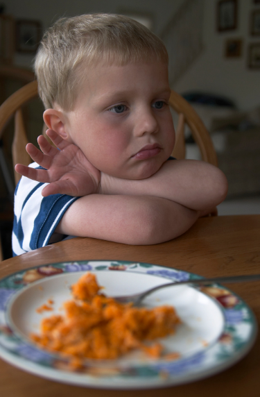 little boy refusing to eat