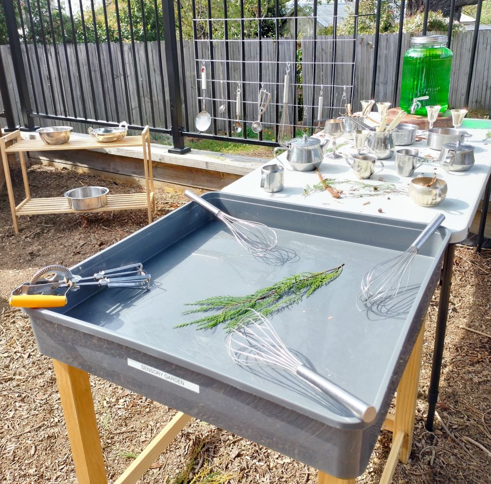 sensory garden playgroup lawson trays with kitchen equipment ready for play