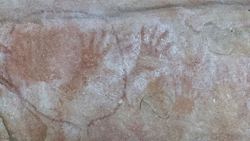 hand prints made from ochre at red hands cave glenbrook