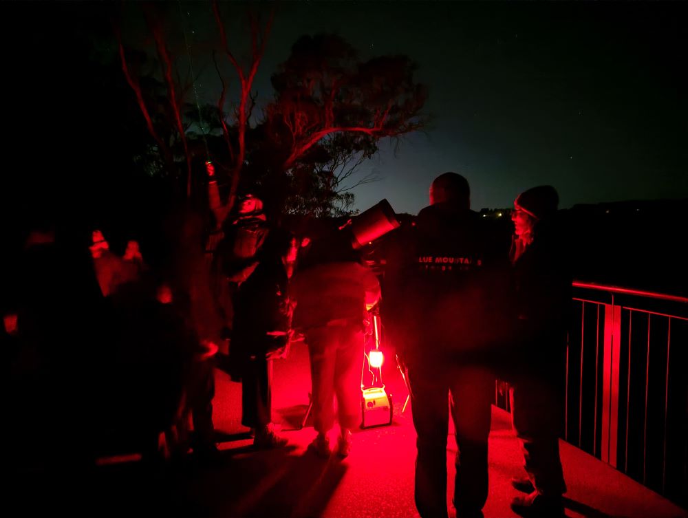 Blue Mountains Stargazing tour group looking through the digital telescope