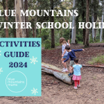 blue mountains winter school holidays activities guide 2024 children climbing on a log